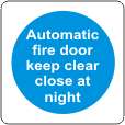 Automatic fire door keep clear. Close at night